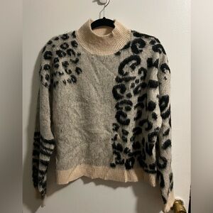 Mock neck animal print sweater